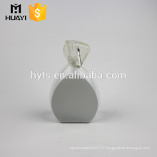 Bouteille en verre de parfum ovale fantaisie blanc égyptien de 100ml